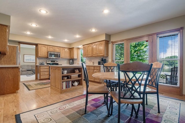 251 Revere Ln N, Champlin, MN 55316 - dining area with light wood-type flooring and recessed lighting