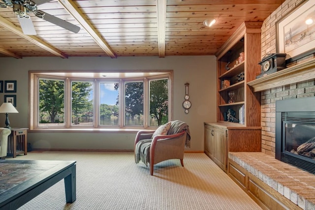 251 Revere Ln N, Champlin, MN 55316 - living area featuring light carpet, a wood ceiling with exposed beams, a ceiling fan, and a brick fireplace
