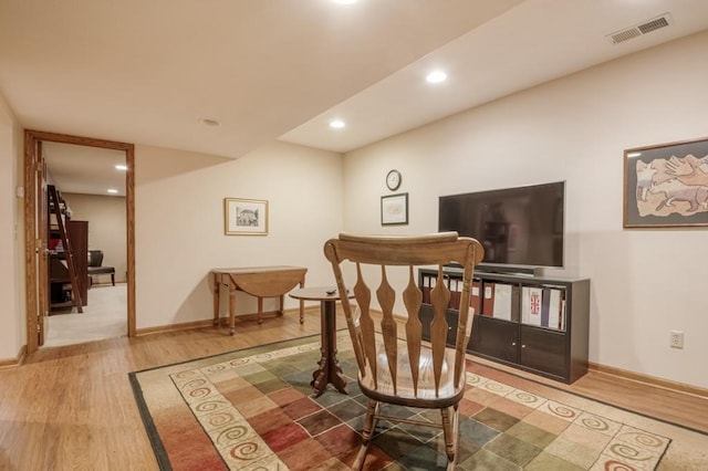 251 Revere Ln N, Champlin, MN 55316 - sitting room featuring wood finished floors and recessed lighting