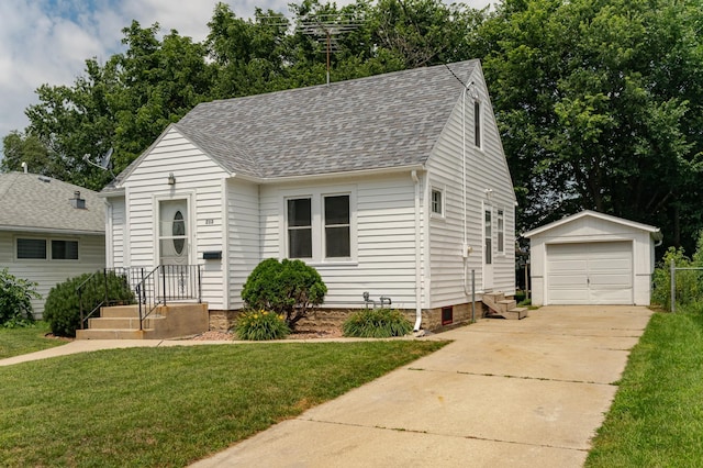 213 11th St SE, Rochester, MN 55904 - view of front of home with an outdoor structure, a shingled roof, a garage, concrete driveway, and a front lawn