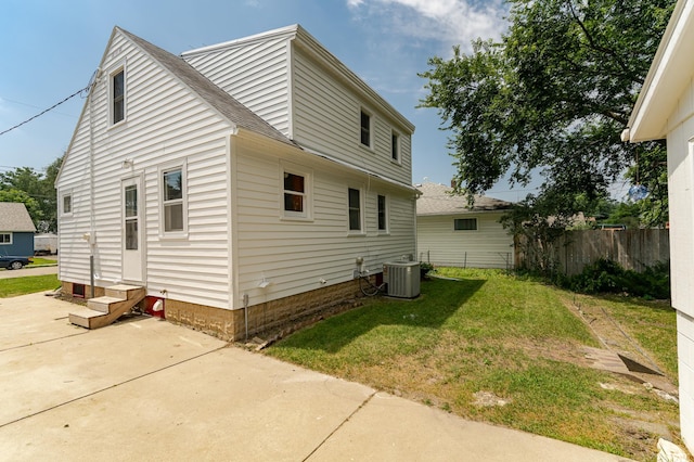 213 11th St SE, Rochester, MN 55904 - view of property exterior with a patio area, entry steps, and a shingled roof