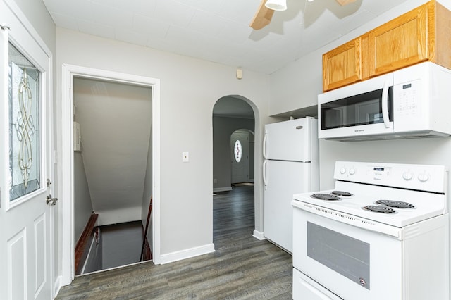 213 11th St SE, Rochester, MN 55904 - kitchen featuring white appliances, dark wood-type flooring, arched walkways, and a ceiling fan