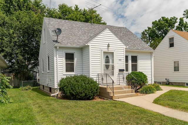 213 11th St SE, Rochester, MN 55904 - view of front of home with a shingled roof