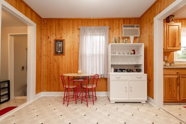 600 1st Ave, Osakis, MN 56360 - dining room with light flooring, wood walls, and a wall mounted air conditioner