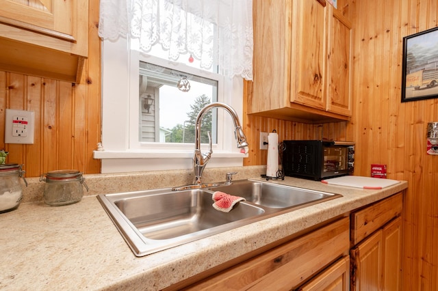 600 1st Ave, Osakis, MN 56360 - kitchen featuring light countertops and wooden walls