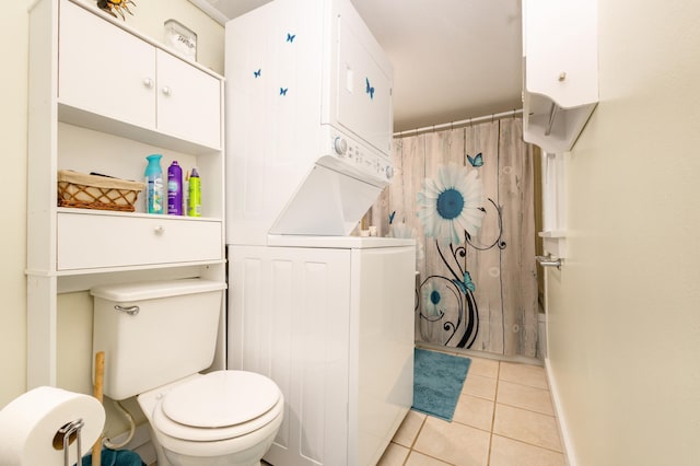 600 1st Ave, Osakis, MN 56360 - bathroom featuring stacked washing machine and dryer and tile patterned floors
