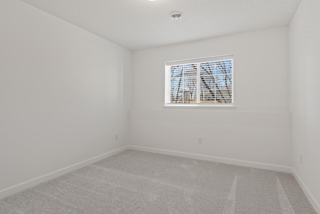 20088 66th Pl, Corcoran, MN 55340 - carpeted empty room featuring baseboards and a textured ceiling