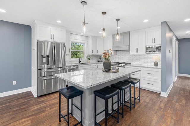 16951 88th Ave N, Maple Grove, MN 55311 - kitchen featuring stainless steel appliances, decorative backsplash, dark wood-style flooring, and recessed lighting