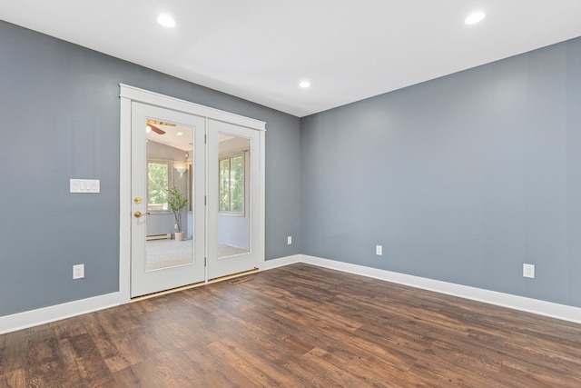16951 88th Ave N, Maple Grove, MN 55311 - unfurnished room with dark wood-style flooring, recessed lighting, and baseboard heating