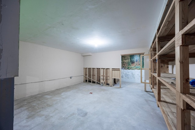 23865 County Rd, Loretto, MN 55357 - empty room with unfinished concrete flooring