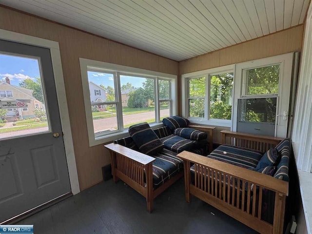 1027 Chapman St, Ely, MN 55731 - sunroom with wood finished floors and wood walls