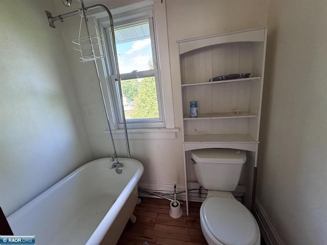 1027 Chapman St, Ely, MN 55731 - bathroom featuring a freestanding tub and wood finished floors