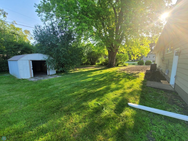 327 Mickey Mouse Ave, Horace, ND 58047 - view of green lawn with a storage unit