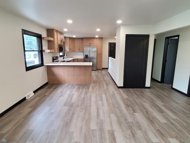 327 Mickey Mouse Ave, Horace, ND 58047 - kitchen featuring a peninsula, open shelves, stainless steel appliances, light wood finished floors, and recessed lighting