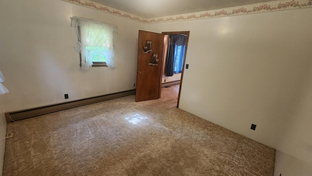 211 2nd St, Hatfield, MN 56164 - carpeted empty room featuring baseboard heating