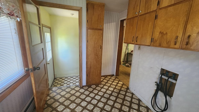211 2nd St, Hatfield, MN 56164 - corridor with baseboard heating and light flooring