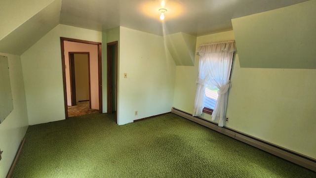 211 2nd St, Hatfield, MN 56164 - additional living space with baseboard heating, dark colored carpet, and lofted ceiling