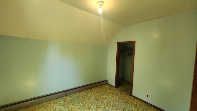 211 2nd St, Hatfield, MN 56164 - additional living space featuring a baseboard heating unit and lofted ceiling