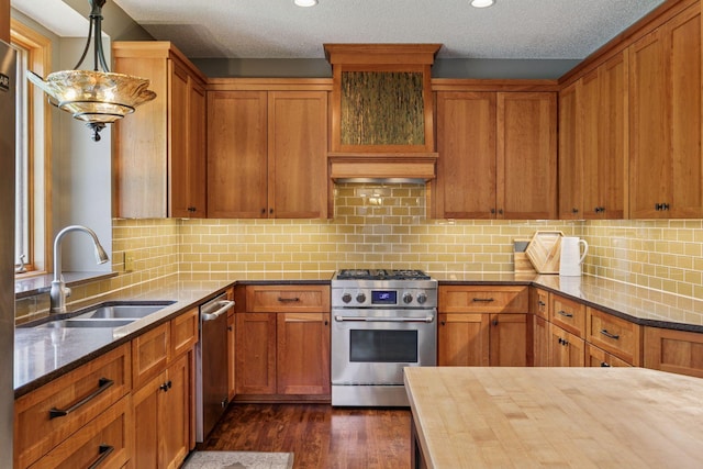 13836 Clare Downs Way, Rosemount, MN 55068 - kitchen featuring stainless steel appliances, dark wood finished floors, brown cabinetry, backsplash, and a textured ceiling