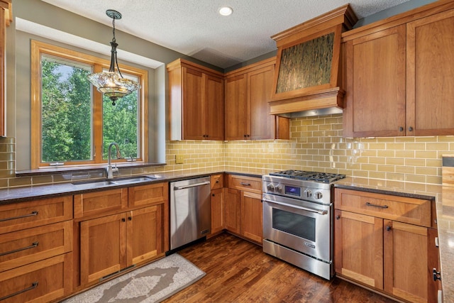 13836 Clare Downs Way, Rosemount, MN 55068 - kitchen with appliances with stainless steel finishes, brown cabinets, a textured ceiling, dark wood finished floors, and custom range hood