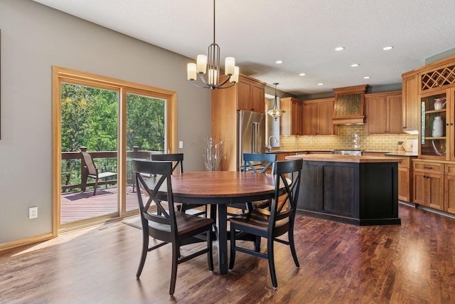 13836 Clare Downs Way, Rosemount, MN 55068 - dining room with a chandelier, dark wood-style flooring, and recessed lighting