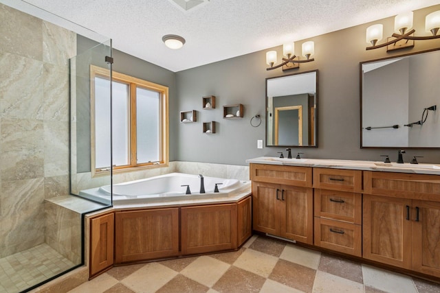 13836 Clare Downs Way, Rosemount, MN 55068 - bathroom featuring a stall shower, a garden tub, double vanity, a textured ceiling, and a chandelier