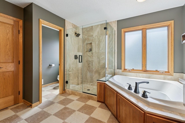 13836 Clare Downs Way, Rosemount, MN 55068 - full bathroom with a bath, a shower stall, and a textured ceiling