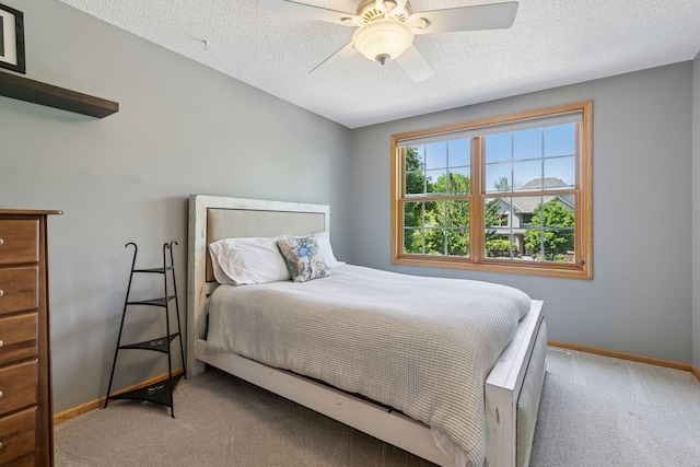 13836 Clare Downs Way, Rosemount, MN 55068 - bedroom featuring carpet flooring, a textured ceiling, and ceiling fan