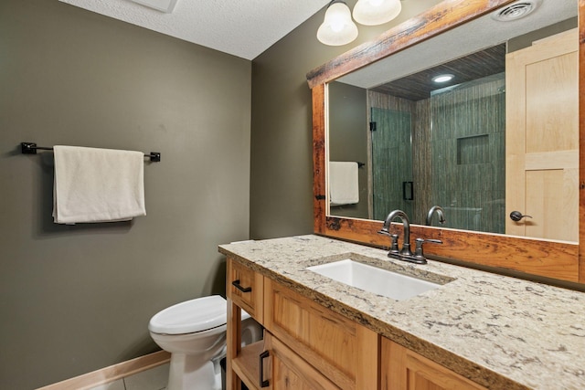 13836 Clare Downs Way, Rosemount, MN 55068 - full bath with vanity, tile patterned floors, a shower with door, and a textured ceiling