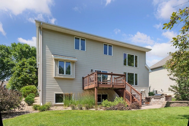 13836 Clare Downs Way, Rosemount, MN 55068 - rear view of house with a wooden deck, a yard, stairway, area for grilling, and a patio
