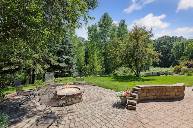 13836 Clare Downs Way, Rosemount, MN 55068 - view of patio featuring a fire pit