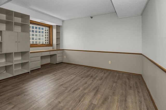 66 9th St E Unit 2315, Saint Paul, MN 55101 - unfurnished office featuring built in desk and wood finished floors