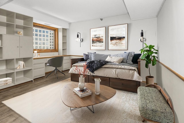 66 9th St E Unit 2315, Saint Paul, MN 55101 - living area with light wood-style floors and a desk