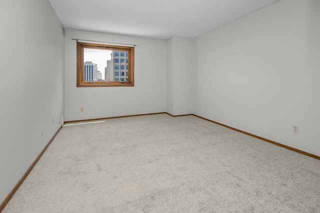 66 9th St E Unit 2315, Saint Paul, MN 55101 - spare room featuring carpet and baseboards
