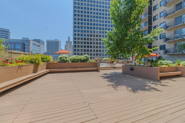 66 9th St E Unit 2315, Saint Paul, MN 55101 - wooden deck featuring a view of city