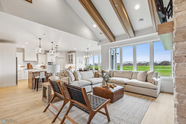 5820 31st St S, Fargo, ND 58104 - living area featuring light wood-style floors, healthy amount of natural light, a chandelier, and recessed lighting