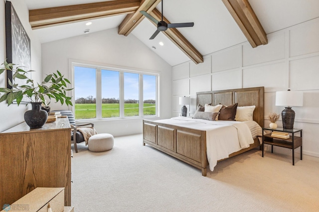 bedroom with ceiling fan, beam ceiling, light colored carpet, and high vaulted ceiling