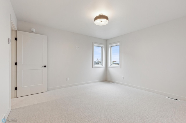5820 31st St S, Fargo, ND 58104 - carpeted empty room with baseboards and a smoke detector