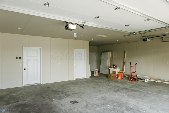 garage featuring a garage door opener