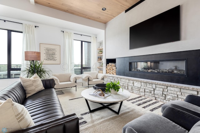 living room with built in features and wood ceiling