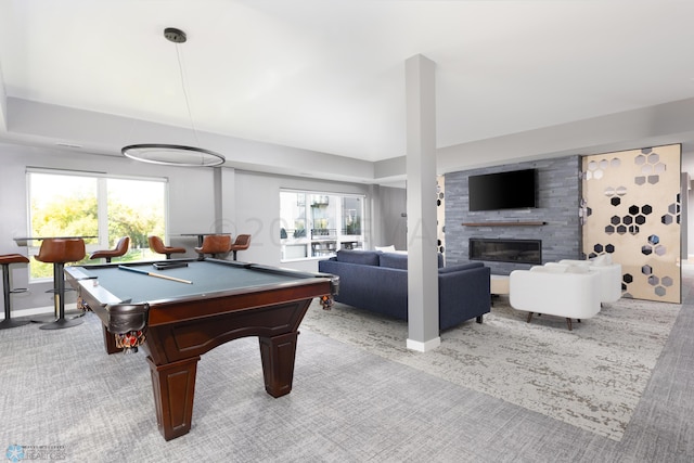 game room featuring plenty of natural light, a large fireplace, and billiards