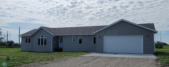 single story home with a garage