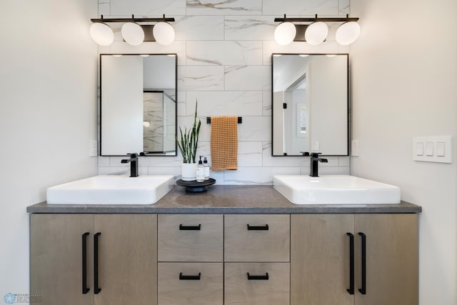 bathroom featuring vanity and decorative backsplash