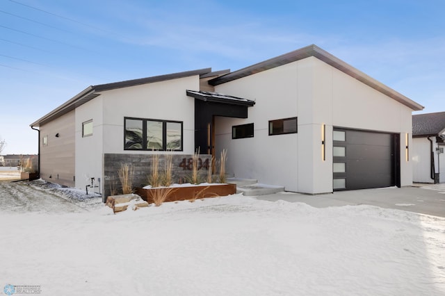 contemporary home featuring a garage