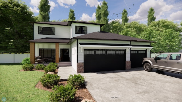 view of front of property with a garage, covered porch, and a front lawn