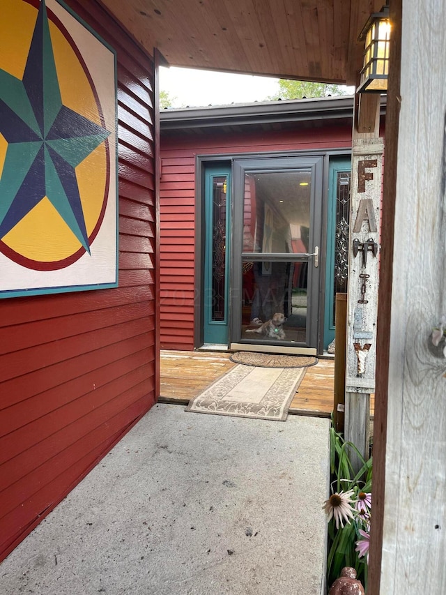 doorway to property featuring a patio