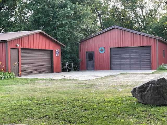 garage featuring a yard