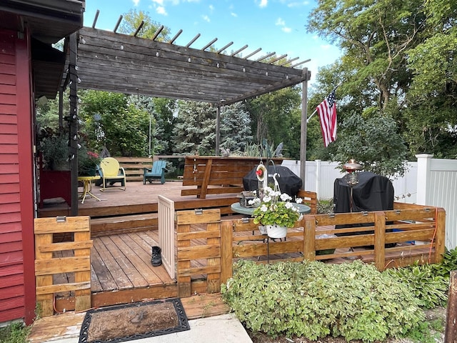 wooden deck featuring a pergola