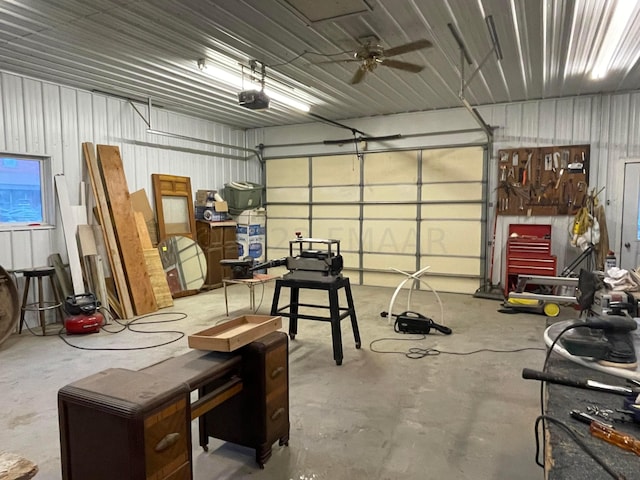 garage with ceiling fan and a garage door opener