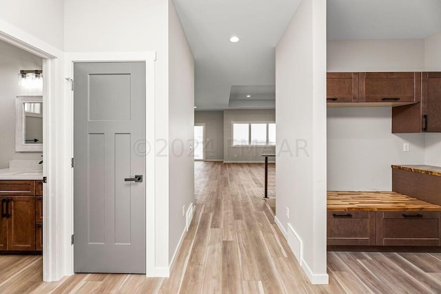 hallway featuring light hardwood / wood-style flooring